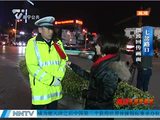 春节期间南宁交警全员上岗 七岔路口交通井然